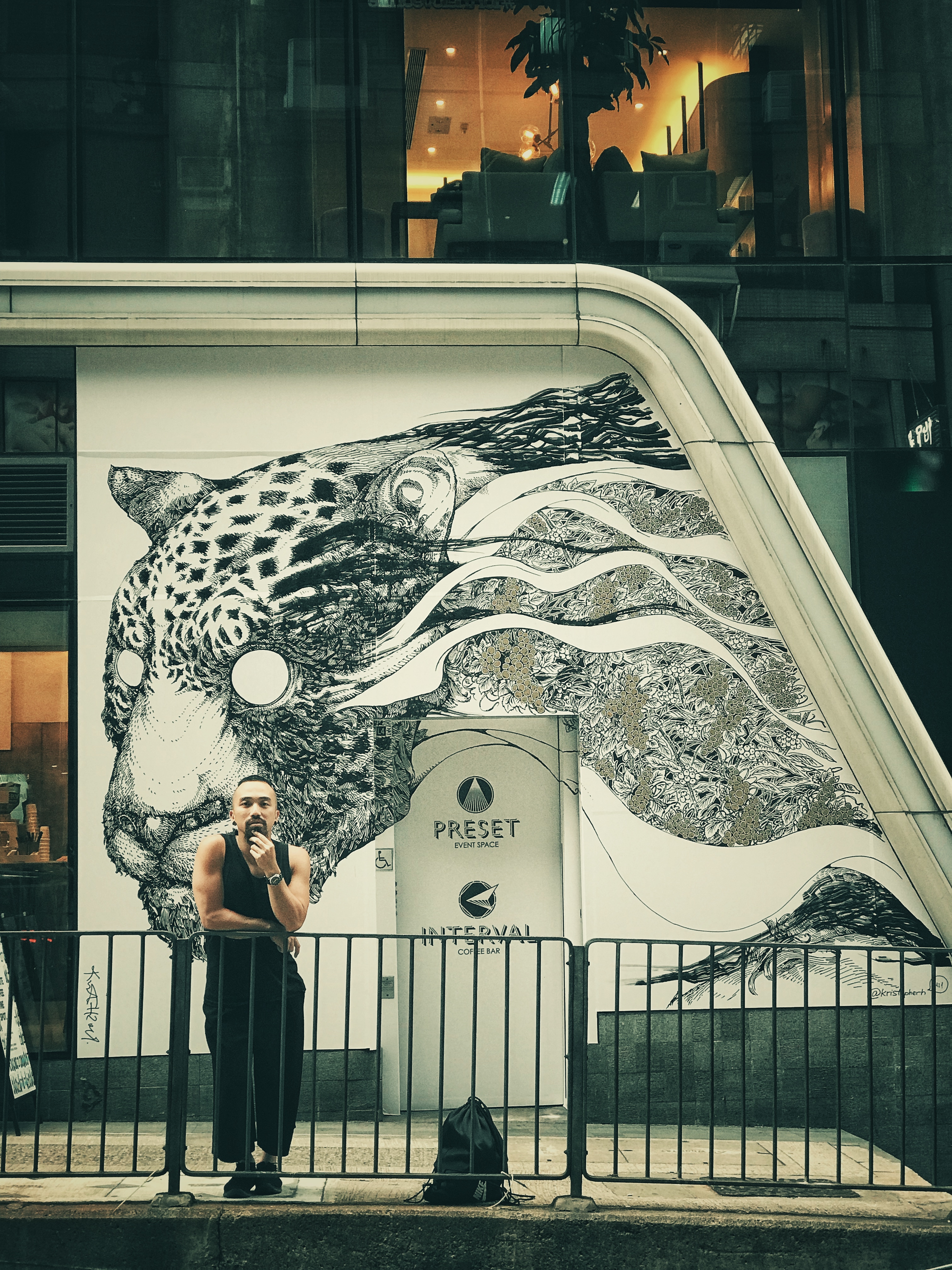 nike store mural running at night in city young black man